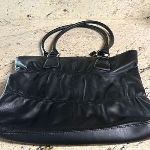 This Anne Klein black purse is like brand new.
